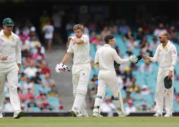 England's Joe Root takes a drink on day five of the Ashes Test match at the SCG. Picture: Jason O'Brien/PA.