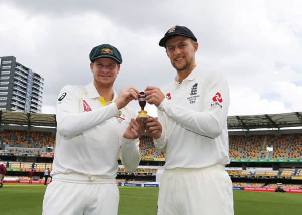 BACK WHEN IT BEGAN: England's Joe Root, right, and Australia's Steve Smith pose before the start of the Ashes Test series at The Gabba, Brisbane. Picture: Jason O'Brien/PA