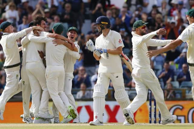 SERIES GONE: Australia celebrate the final wicket of Chris Woakes to win The Ashes on day five at the WACA in Perth. Picture: Jason O'Brien/PA