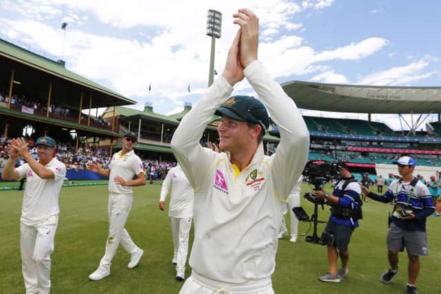 Australia captain Steve Smith celebrates winning fifth and final Ashes Test with his players on day five at the SCG. Picture: Jason O'Brien/PA