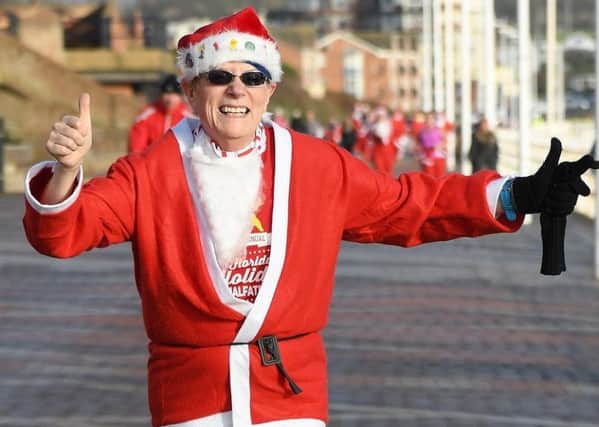 Sandra Orlando completes the Santa Run in Bridlington last month