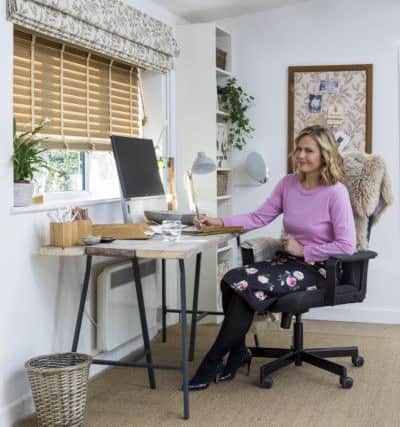 Liz Earle at her desk, which is by a window. Blinds are essential and 
include Illusions Oakwood venetians from Â£87;  Delizia roman blinds, Â£135 and a Serene linen voile, from Â£54., from www.Hillarys.co.uk