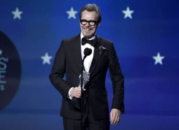 Gary Oldman accepts the award for best actor - film for "The Darkest Hour" at the 23rd annual Critics' Choice Awards