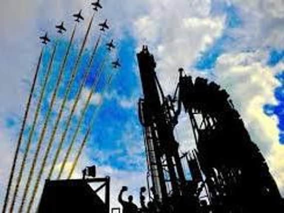The Red Arrows flying over Sirius Minerals exploration drilling rig at its North Yorkshire polyhalite project
