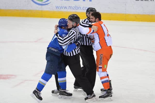 Mathieu Roy gets to grip with a Nomad Astana opponent in the second period. Picture: Dean Woolley.