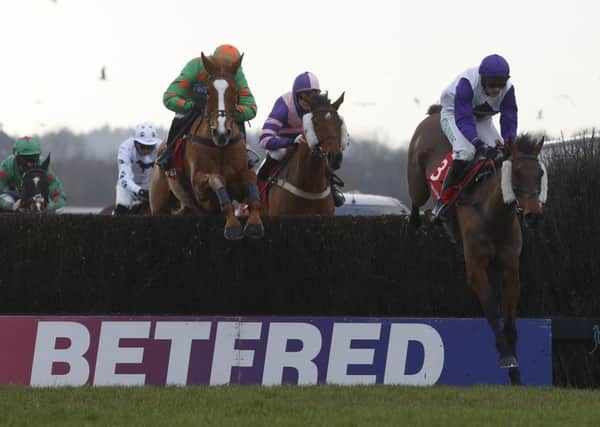 MS Parfois ridden by Sean Bowen (left) clear an early fence before going on to win The Betfred Home Of Goals Galore Hampton Novices' Steeple Chase Race run during Betfred Classic Chase Day at Warwick racecourse, Warwick.