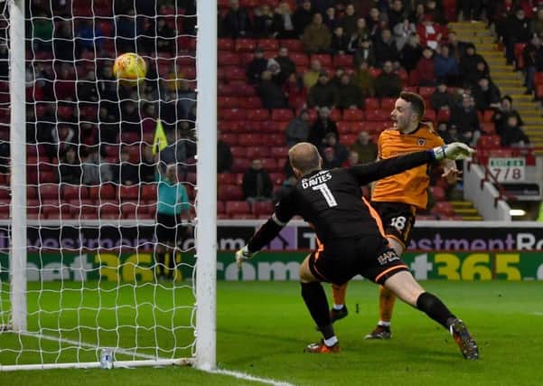 Wolverhampton Wanderers' Diogo Jota sees his goal disallowed for off side during the Sky Bet Championship match at Oakwell, Barnsley.