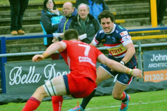 Paul Jarvis of Doncaster Knights  jinks past Sam Graham to score a try against  Bristol in the B and I Cup.