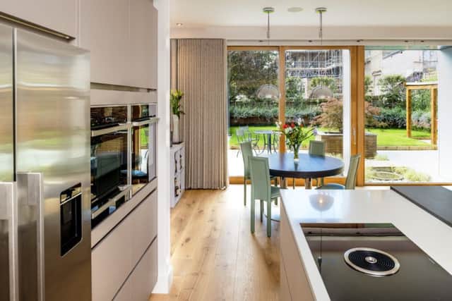 The kitchen by Scammell Interiors includes a Bora hob with built-in extractor that takes fumes down and out of the house via ducting under the floor