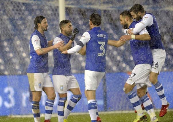 Snow joke: Marco Matias, second left, is congratulated by Sheffield Wednesday team-mates, including Atdhe Nuhiu, second right, who scored the Owls clinching goal. (Picture: Steve Ellis)