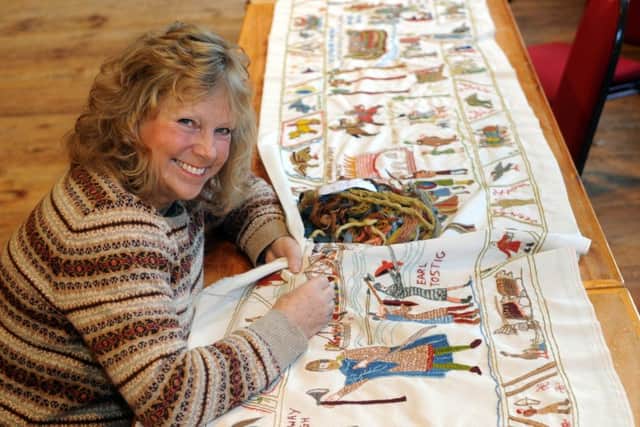 Mary Ann Dearlove, one of the team of embroiders putting the finishing touches to tapestry depicting the Battle of Fulford in 1066.