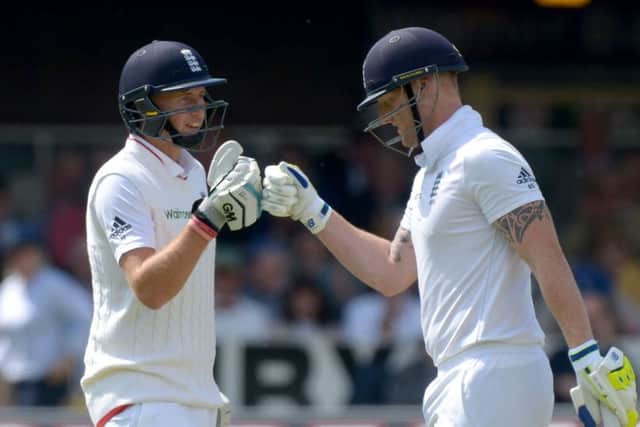 England's Joe Root and Ben Stokes, right. Picture: PA.