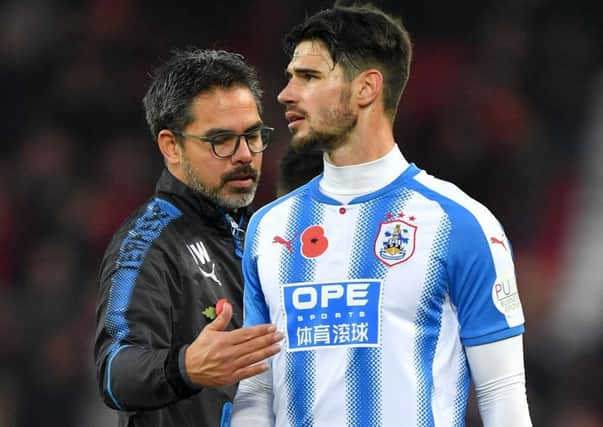 Determined to stay safe: Huddersfield Town coach David Wagner and Christopher Schindler.