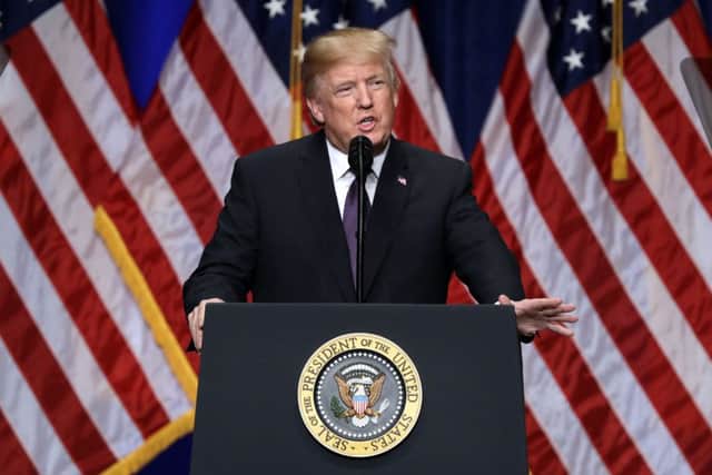 President Donald Trump speaks on national security Monday, Dec. 18, 2017, in Washington. Trump says his new national security strategy puts "America First." (AP Photo/Evan Vucci)