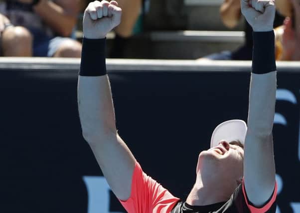 Britain's Kyle Edmund celebrates after defeating Georgia's Nikoloz Basilashvili in their third round match at the Australian Open. (AP Photo/Ng Han Guan)