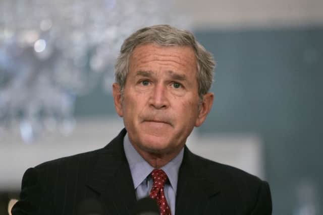 George W. Bush  (AP Photo/Evan Vucci)