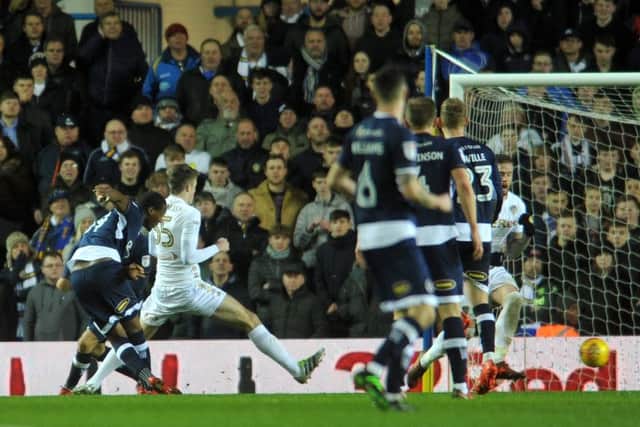 LATE BLOW: Millwall'sTom Elliott scores a late equaliser, their third goal. Picture: Tony Johnson.
