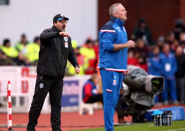 TOUGH TIMES: Huddersfield Town manager David Wagner (left) and Stoke City manager Paul Lambert. Picture: Nigel French/PA