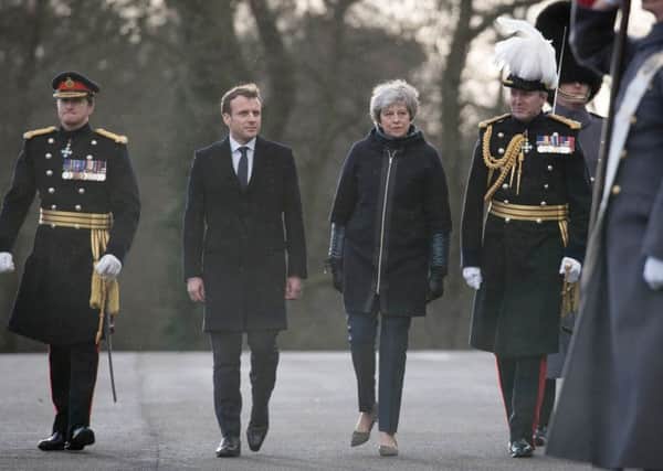 Prime Minister Theresa May and French President Emmanuel Macron at the Royal Military Academy Sandhurst, ahead of UK-France summit talks last week.