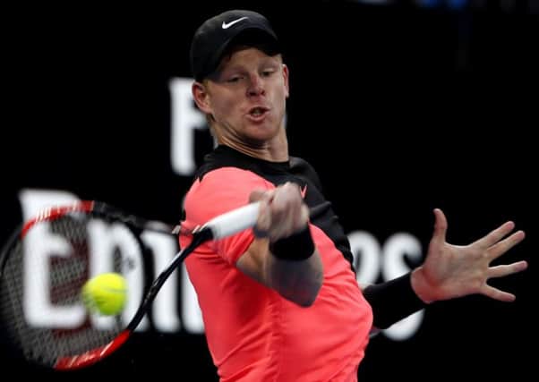 Kyle Edmund hits a forehand return to Italy's Andreas Seppi during his fourth round win. Picture: AP/Ng Han Guan