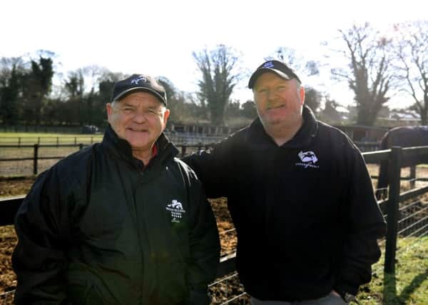 Definitly Red's trainer Brian Ellison, left, and owner Phil Martin.