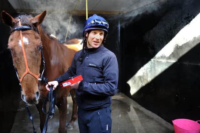 Jockey Danny Cook and Definitly Red.