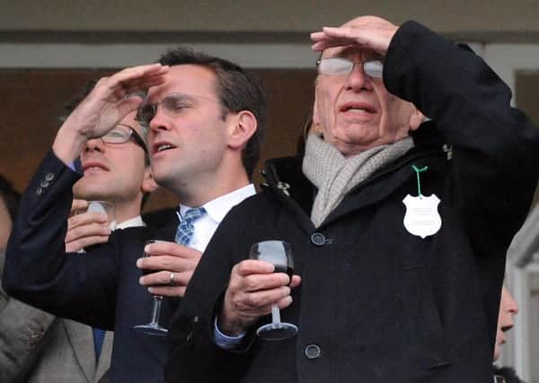 James Murdoch (left) and Rupert Murdoch (right). Pic: Barry Batchelor/PA Wire