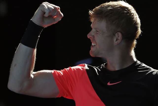 Britain's Kyle Edmund reacts after defeating Bulgaria's Grigor Dimitrov in their quarter-final at the Australian Open . (AP Photo/Ng Han Guan)