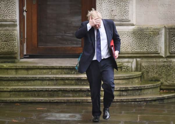 Boris Johnson arrives in 10 Downing Street for this week's Cabinet meeting.