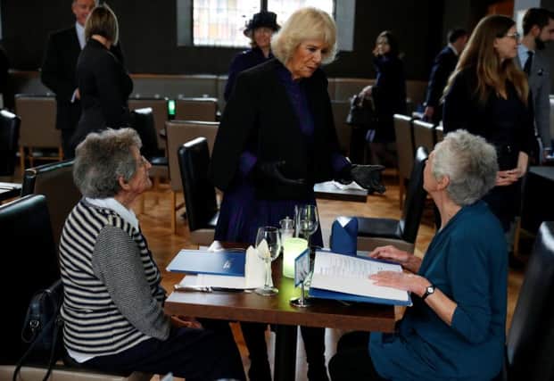 The Duchess of Cornwall speaks to diners during her visit to The Clink restaurant at HMP Styal in Wilmslow