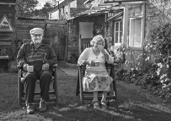 Herbert and Betty Fox taken in 2015. 
Every day, at four oclock, Herbert and Betty sit side by side with a cup of tea, outside if the
weather is good enough. Betty got the giggles recounting the nurses visit that morning, to give
them their flu jabs: Herbert said he hoped her needle was sharp enough to get through his tough
skin, and if it was not, she could borrow his grindstone to sharpen it.
