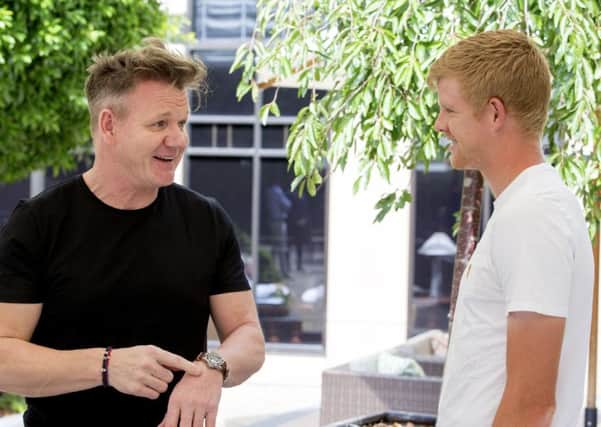 Kyle Edmund, right, talks with celebrity chef Gordon Ramsay at the Australian Open.