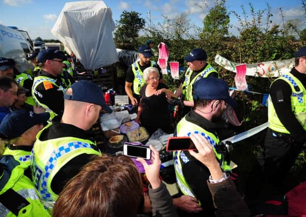 Fracking protests last year when police tried to evict tea lady Jackie Brookes from her table if she didn't move.