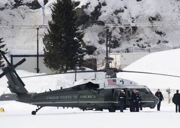 Donald Trump leaves Marine One as he arrives at Davos for the World Economic Forum.