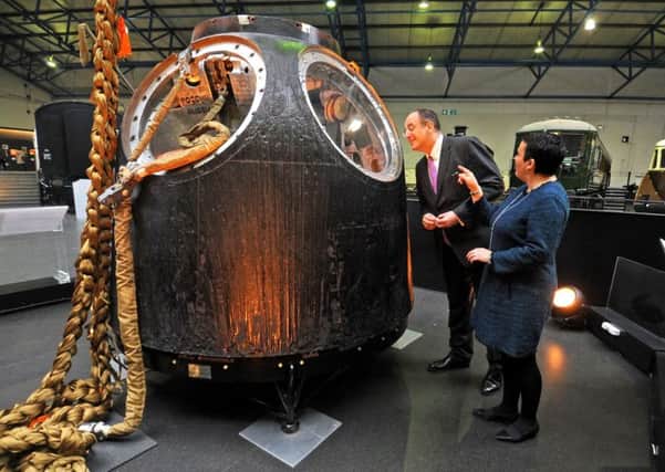 Arts Minister Michael Ellis with Tim Peake's space capsule on show at the National Railway Museum by the venue's director, Judith McNicol. Picture: Tony Johnson.
