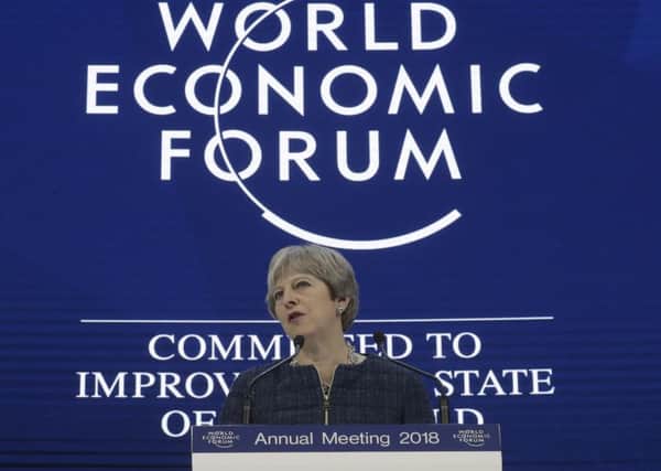 Theresa May speaks at the World Economic Forum in Davos.