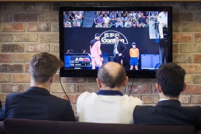 Alejandro (right), tennis coach Trevor Loten (centre) and Charlie watch Kyle Edmund taken on Marin Cilic on a TV at Fenwick-Smith House, a senior boarding house at at Pocklington Prep School, Beverley. (Picture: Danny Lawson/PA Wire)