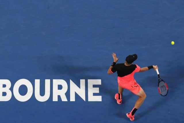 Britain's Kyle Edmund makes a forehand return to Croatia's Marin Cilic during their semifinal at the Australian Open tennis championships in Melbourne. (AP Photo/Ng Han Guan)