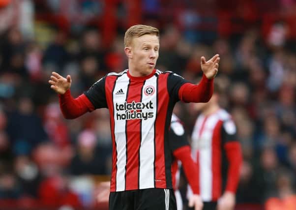 OFFERING GUIDANCE: Mark Duffy, who has signed a new deal at Sheffield United, points the way forward for his colleagues, who have grown in number during the January transfer window. Picture: Simon Bellis/Sportmage