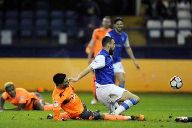 Sheffield Wednesday striker Atdhe Nuhiu nets his second goal of the evening to help beat Reading 3-1 at Hillsborough last night in the FA Cup (Picture: Steve Ellis).