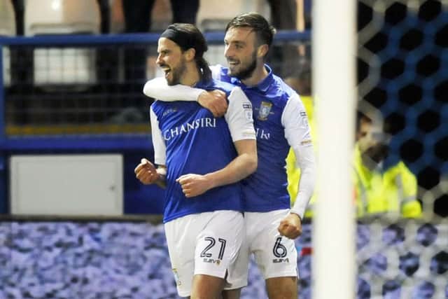 TOP MAN: George Boyd celebrates his goal and Sheffield Wednesday's third. Picture: Steve Ellis