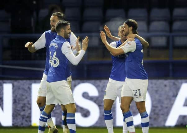 Sheffield Wednesday's players celebrate their third goal against Reading. Picture: Steve Ellis