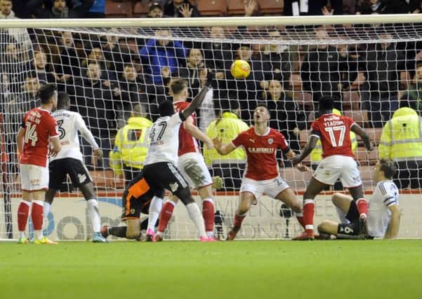 Fulham player Kevin McDonald (right) scores to make to 2-1.