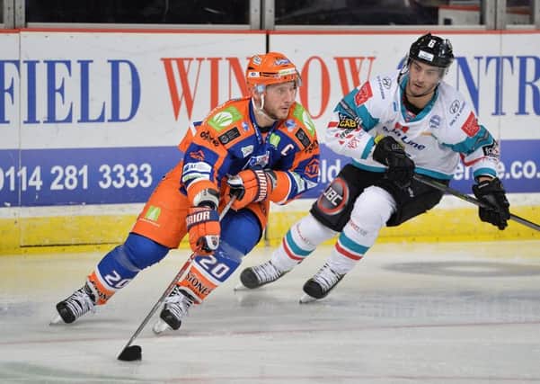 ON THE BOARD: Jonathan Phillips scored a third period goal against Belfast Giants. Picture: Dean Wooley.