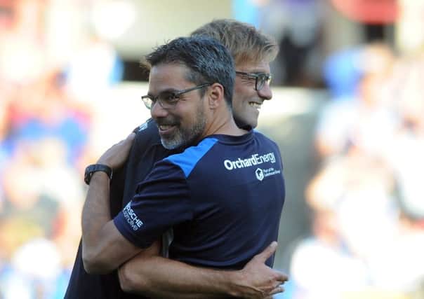 Friends for ever: Jurgen Klopp, left, and David Wagner, right, put their friendship to one side tonight as Klopps Liverpool visit Wagners Huddersfield Town in the Premier League. (Picture: Tony Johnson)