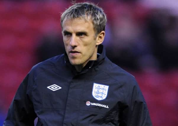 Will Phil Neville be a success as head coach of the England women's football team? (PA).