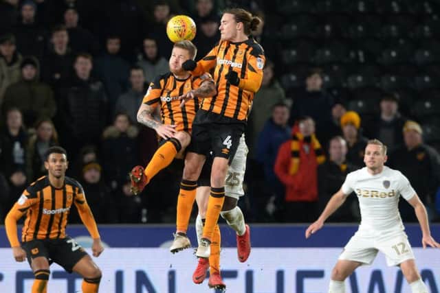 Seb Larsson and Jackson Irvine rise with Ronaldo Vieira for a high ball.  Picture: Bruce Rollinson