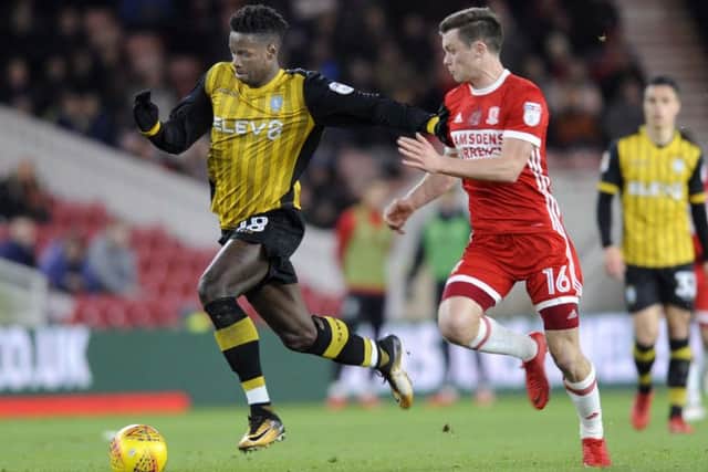 CATCH ME IF YOU CAN: Lucas Joao tries to get away from Middlesbrough's Jonny Howson. Picture: Steve Ellis