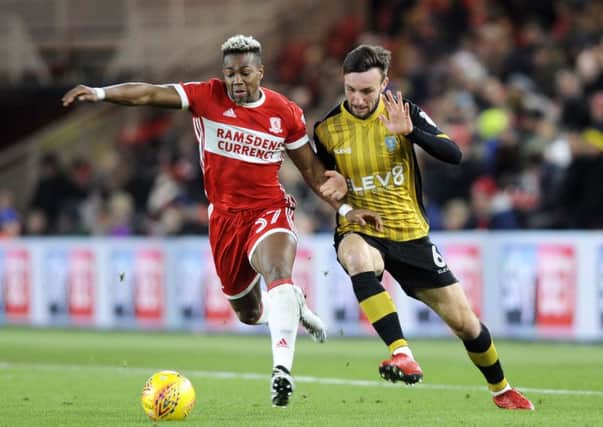 CLOSE-FOUGHT: Sheffield Wednesday's Morgan Fox, left, battles for the ball with Middlesbrough's Adama Traore. Picture: Steve Ellis