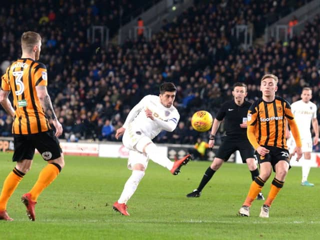 Leeds United's Pablo Hernandez fires in a shot as 
Hull City's Jarrod Bowen, right, looks on.  Picture: Bruce Rollinson